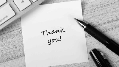 Hand written note with "Thank you" to clients